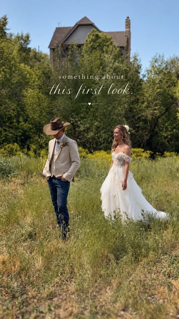 A bride approaching her groom in a sunlit meadow